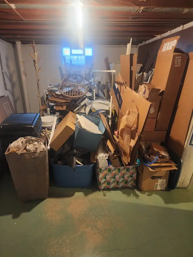 Roll-off dumpster container at job site for Concrete Dumpster Rental in Hudson Falls